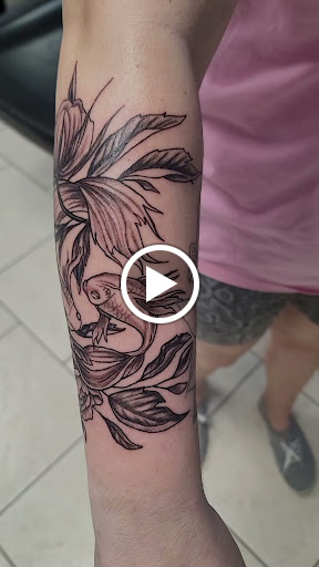 Explore bonnie and clyde tattoo ideas, creative tattoo ideas in Ocoee, available at Slaughterized Ink Tattoo and Piercing Studio