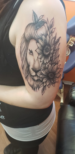 Explore tattoo ideas for top of foot, creative tattoo ideas in Bessemer City, available at Twisted Ink