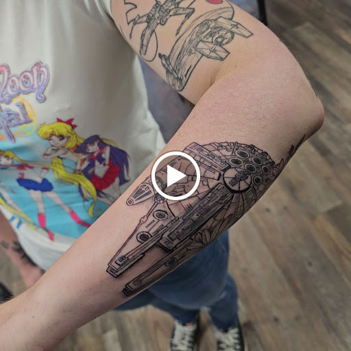 Explore front thigh tattoo ideas for women, creative tattoo ideas in Traverse City, available at Pinups & Needles