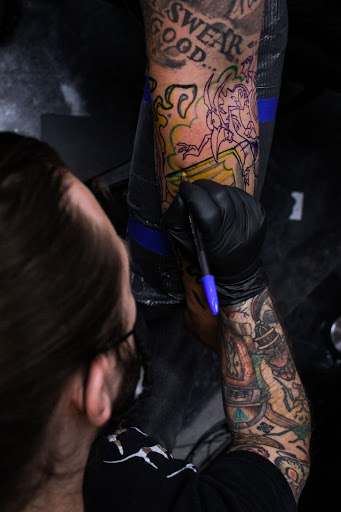 Explore chest and arm tattoo ideas, creative tattoo ideas in Stockbridge, available at Black Rose Tattoo Collective