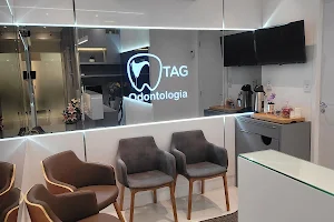 Clínica Odontológica Tag | 24 horas | Dentista em Florianópolis - Prótese Protocolo - Implante Dentário -Tratamento de canal image