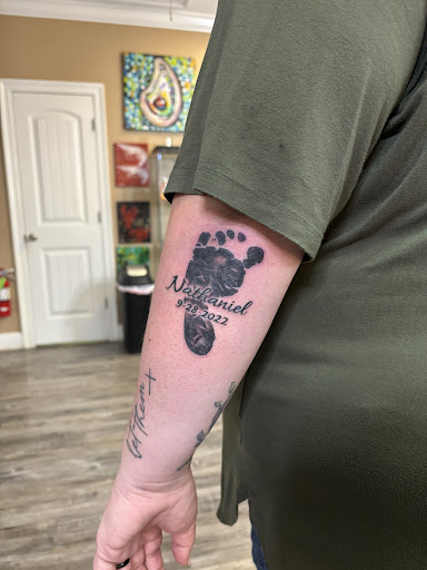 Explore forget me not tattoo ideas, creative tattoo ideas in Leesville, available at Revolution Ink Tattoo and Art Gallery