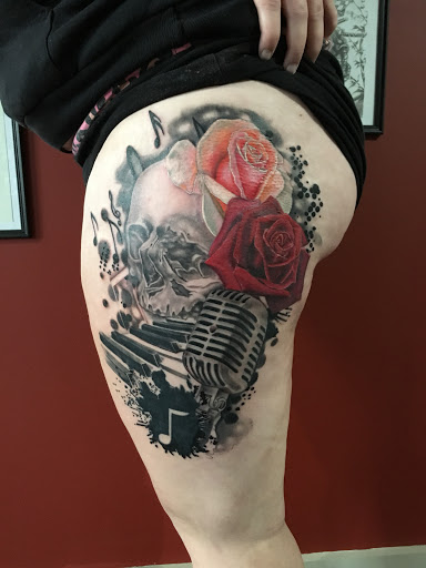 Explore songbird tattoo ideas, creative tattoo ideas in Kingsford, available at Deft Tattoo Studio