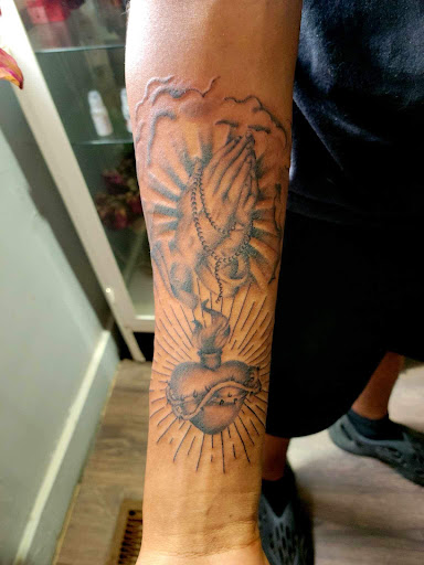 Find top of head tattoo ideas for your next unique tattoo in Warrensburg at Altered Visions Tattoo Studio