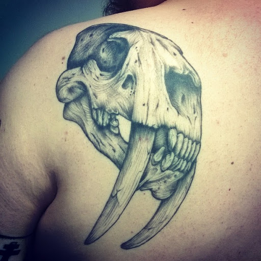 Explore spine tattoo ideas for men, creative tattoo ideas in Bothell, available at Hometown Tattoo