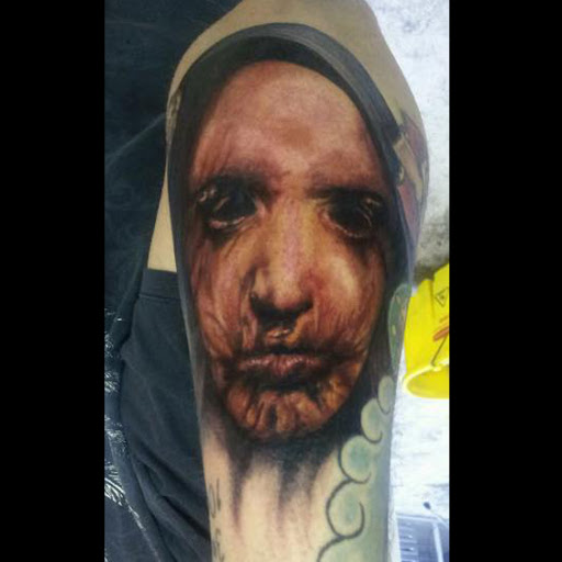 Explore tiny hummingbird tattoo ideas, creative tattoo ideas in Broken Arrow, available at Geek Ink Tattoo and Piercings