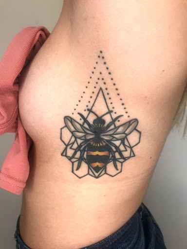 Explore hand tattoo ideas simple, creative tattoo ideas in Kearney, available at Bread N Butter Tattoo