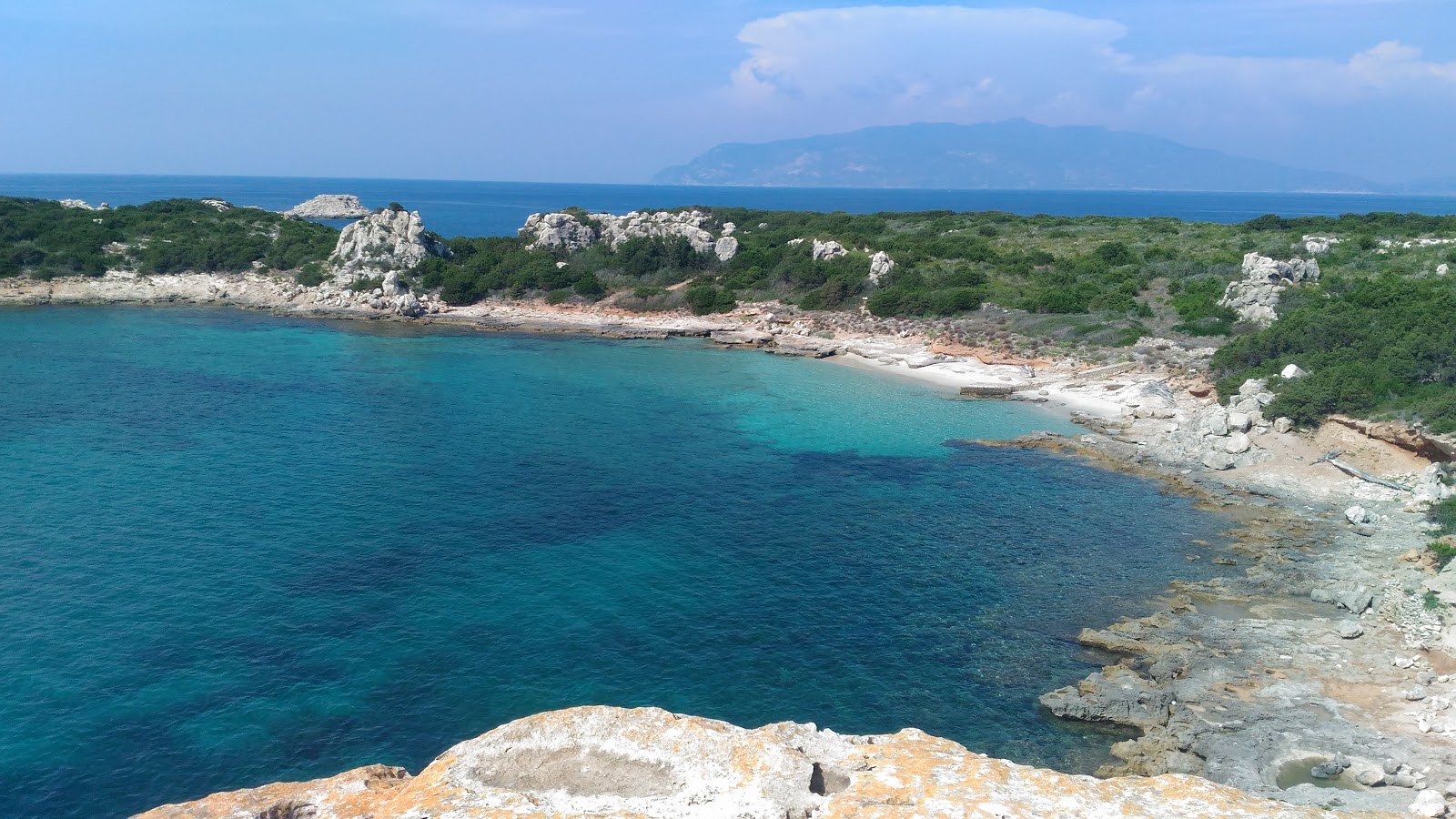 Foto de Spiaggia di Porto Romano localizado em área natural