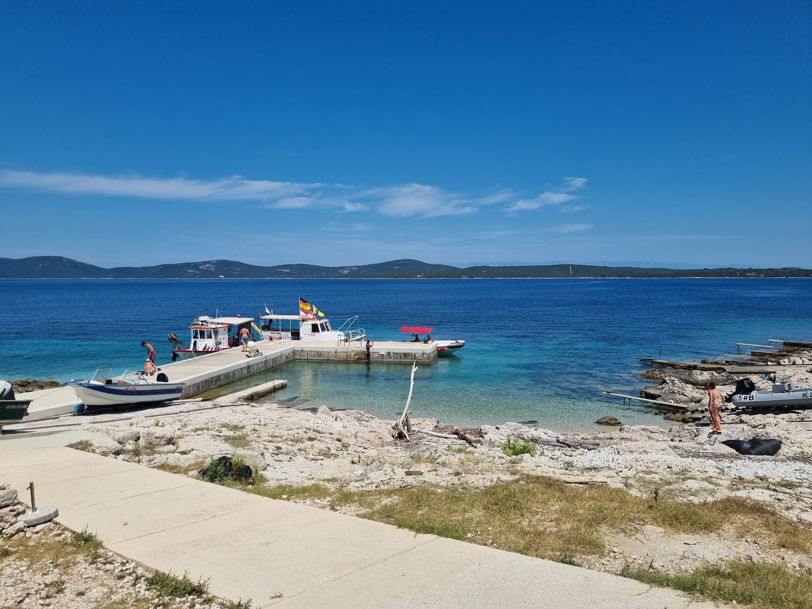 Foto von Male Srakane Beach mit felsiges gelände Oberfläche