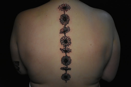 Explore side tattoo ideas, creative tattoo ideas in Richmond, available at 33 Lions Tattoo Gallery