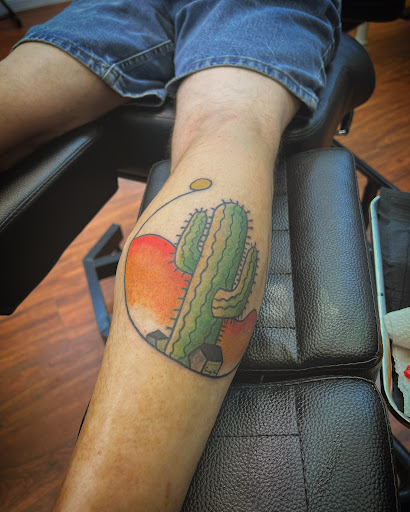 Explore arm tattoo ideas flowers, creative tattoo ideas in Cocoa, available at Rorschach Tattoo Shop and Piercing Studio