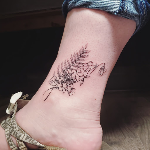 Explore bowhunting tattoo ideas, creative tattoo ideas in Stevens Point, available at International Ink Tattoos