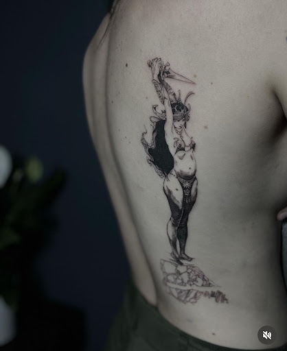 Explore knee tattoo ideas for men, creative tattoo ideas in Charlotte, available at Canvas Tattoo & Art Gallery