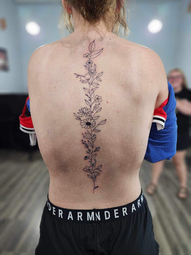 Explore fine line tattoo ideas for females, creative tattoo ideas in Windsor, available at Spillen Ink