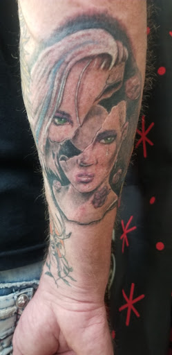 Explore snake tattoo ideas, creative tattoo ideas in Denver, available at Emporium of Design