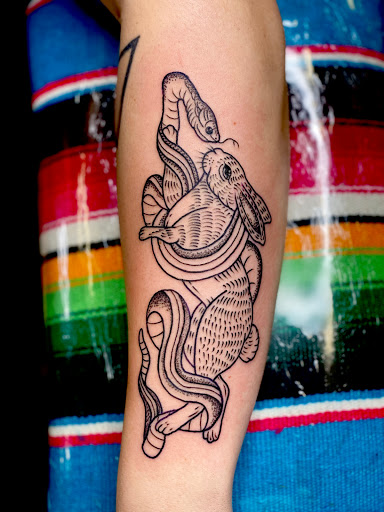 Explore love and war tattoo ideas, creative tattoo ideas in Modesto, available at Inkwell Tattoo