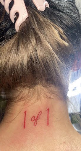 Explore feminine cross tattoo ideas, creative tattoo ideas in Lake Villa, available at Eternal Tiger Tattoo