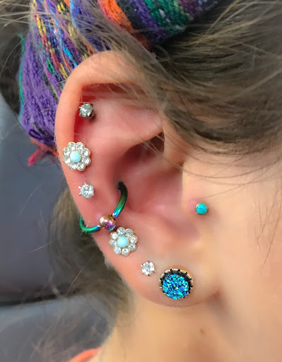 Explore wife name tattoo ideas on chest, creative tattoo ideas in Springfield, available at Body Piercing By Qui Qui