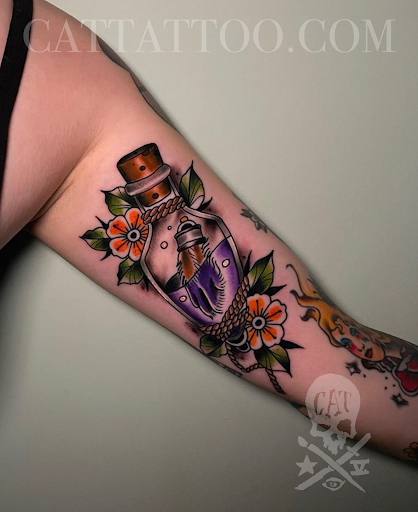 Explore hand and finger tattoo ideas, creative tattoo ideas in Addison, available at Cat Tattoo