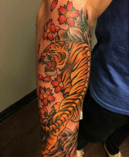 Explore mental health ribbon tattoo ideas, creative tattoo ideas in Rowlett, available at Fresh Image Tattoo Studios