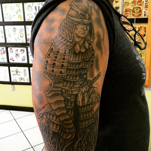 Explore halloween tattoo sleeve ideas, creative tattoo ideas in Miami, available at Tattoos by Lou Miami - Kendall