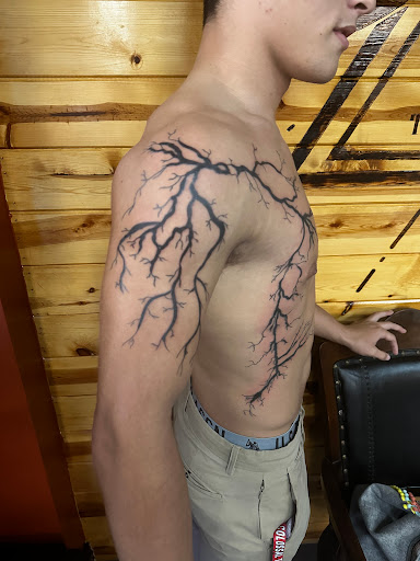 Explore heart with wings tattoo ideas, creative tattoo ideas in Foley, available at Symbolic Ink Tattoo Studio