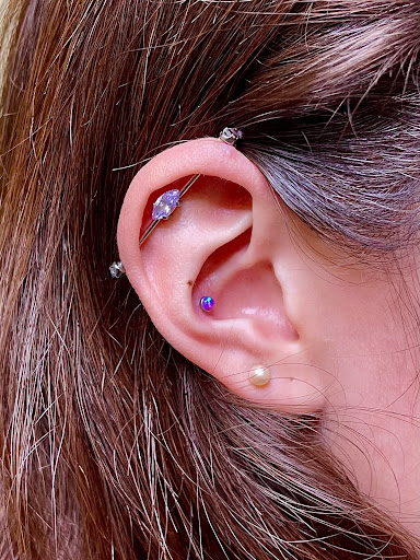 Explore sunflower thigh tattoo ideas, creative tattoo ideas in San Diego, available at Rose Body Piercing