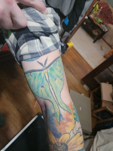 Explore map tattoo ideas, creative tattoo ideas in Wickliffe, available at Distinctive Tattoo Studios