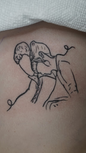 Explore finger tattoo ideas for guys, creative tattoo ideas in Arlington, available at Benchmark Tattoos