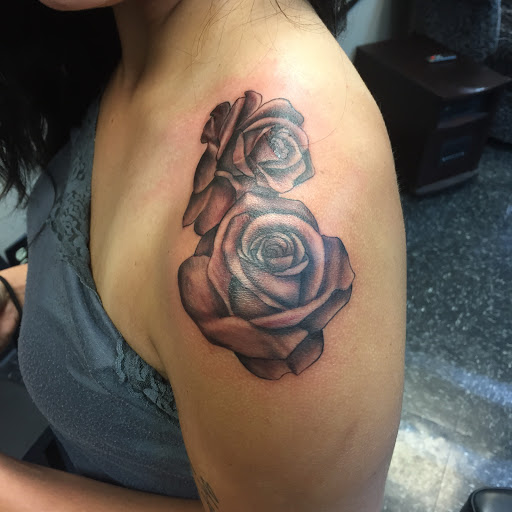 Explore raccoon tattoo ideas, creative tattoo ideas in Overland Park, available at Aftershock Tattoo Co.