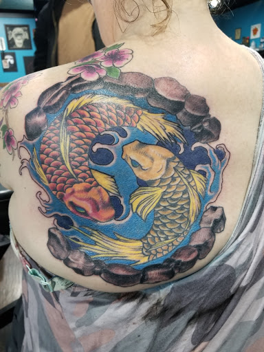 Explore cool upper arm tattoo ideas, creative tattoo ideas in Longview, available at Anchor Down Tattoo and Piercing