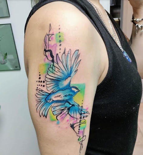 Explore fox and the hound tattoo ideas, creative tattoo ideas in Orange Park, available at All Aces Tattoo and Body Piercing LLC