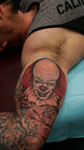 Explore tattoo ideas male back, creative tattoo ideas in Ocala, available at Lone Wolf Tattoo