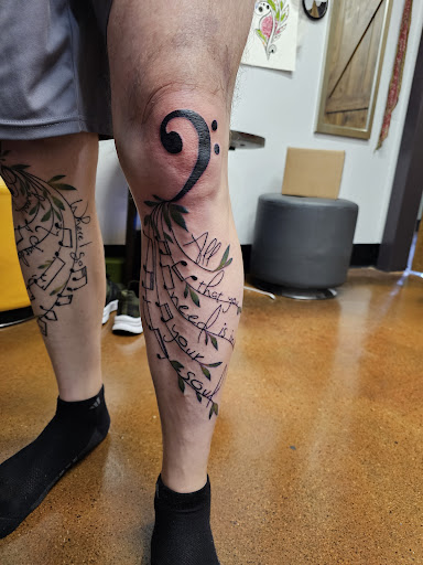 Explore bookworm tattoo ideas, creative tattoo ideas in Toledo, available at Infinite Art Tattoo Studio