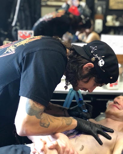 Find tattoo ideas roses for your next unique tattoo in Dallas at Artistic Encounter