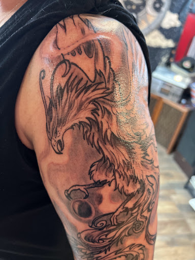 Explore matching brother tattoo ideas, creative tattoo ideas in Pikeville, available at The Carbon Canary Tattoo Studio