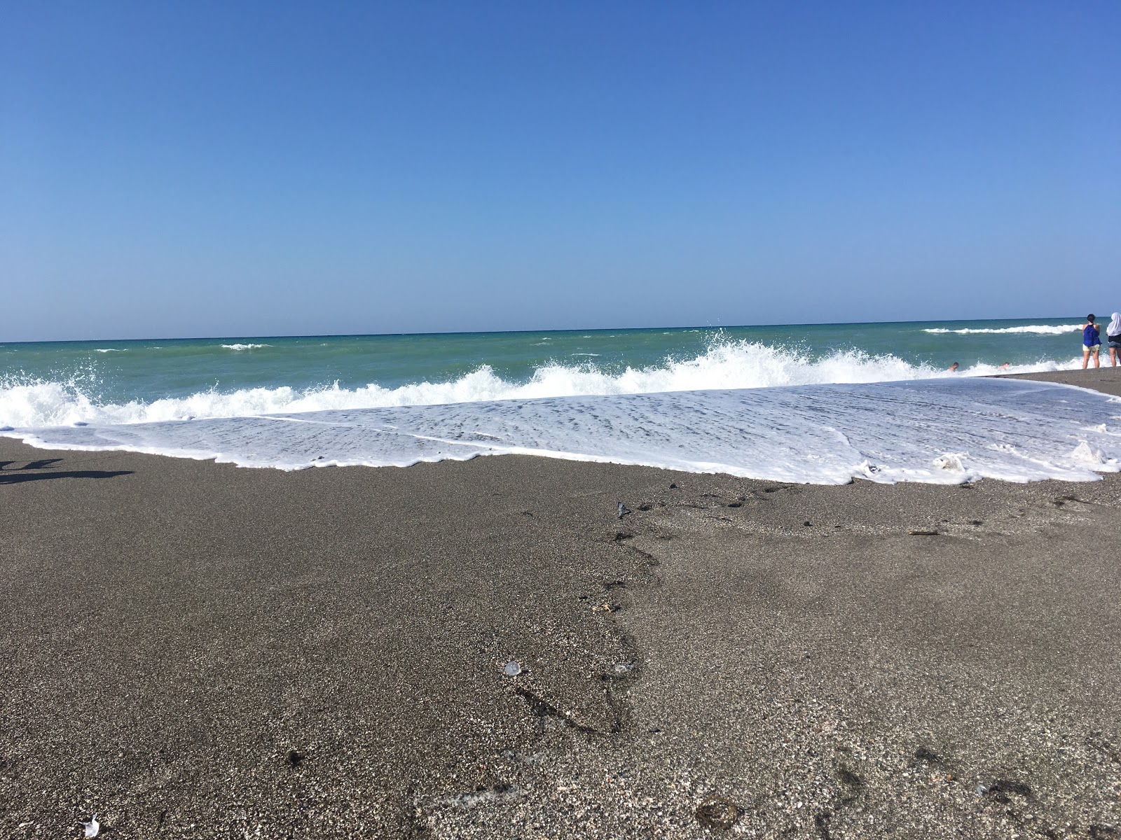 Fotografie cu Sahilkent Beach cu o suprafață de nisip gri