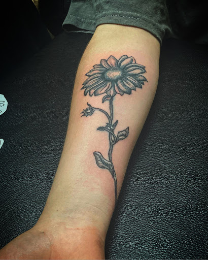 Explore cover up tattoo ideas for women, creative tattoo ideas in Cocoa, available at Rorschach Tattoo Shop and Piercing Studio