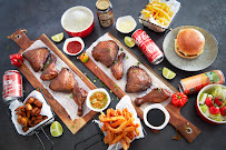 Plats et boissons du Restaurant caribéen Wood'n Chicken - Poulet Boucané à Ivry-sur-Seine - n°1