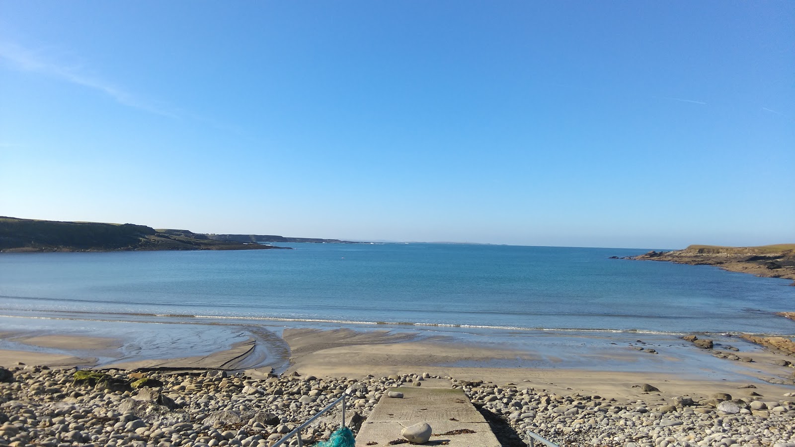 Whitestrand Beach的照片 带有宽敞的海湾