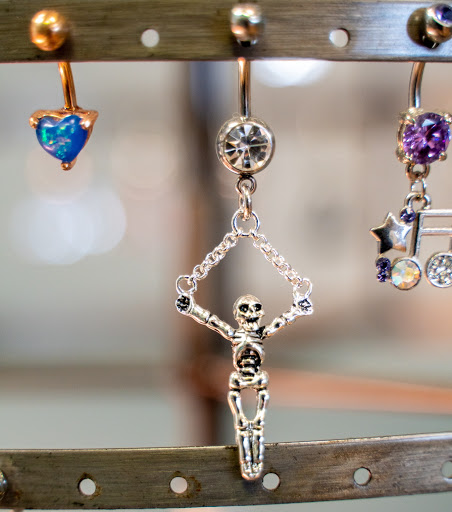 Explore breast cancer tattoo ideas, creative tattoo ideas in Charleston, available at Exotic Impressions Body Piercing