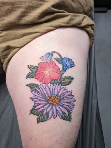 Explore scuba diving tattoo ideas, creative tattoo ideas in East Lansing, available at Splash of Color Tattoo & Piercing Studio