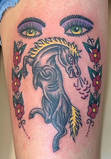 Explore tattoos tramp stamp ideas, creative tattoo ideas in Brunswick, available at Blue Fin Tattoos