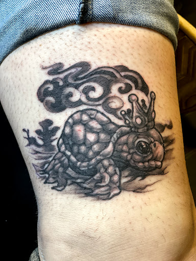 Explore first born son tattoo ideas, creative tattoo ideas in Milford, available at Golden Hammer Tattoo Studios