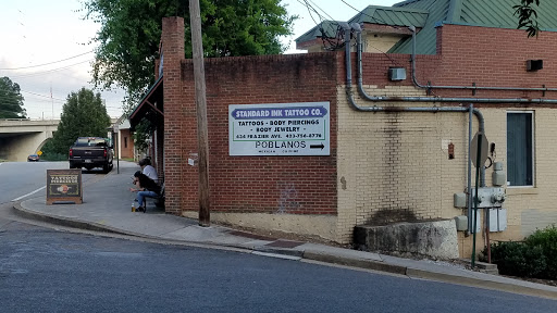 Find under boob tattoo ideas for your next unique tattoo in Chattanooga at Standard Ink Tattoo Co