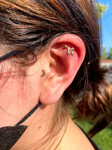 Explore guitarist tattoo ideas, creative tattoo ideas in Visalia, available at La Luna Piercings and Fine Jewelry