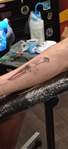 Explore small color tattoo ideas, creative tattoo ideas in Middletown, available at Traditionally Twisted Tattoo