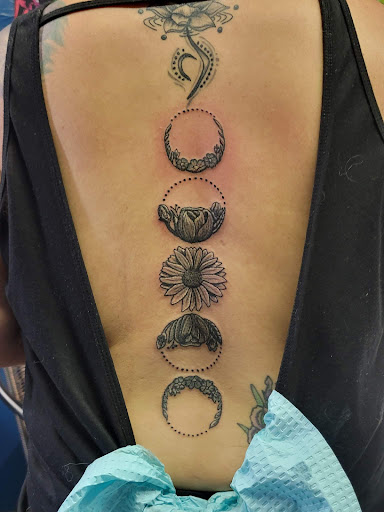 Explore small neck tattoo ideas, creative tattoo ideas in Spokane, available at Sweet Inks & Cool Peeps