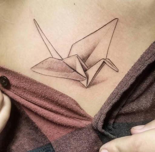 Explore tattoo ideas in french, creative tattoo ideas in Kenosha, available at Kenosha Tattoo Company