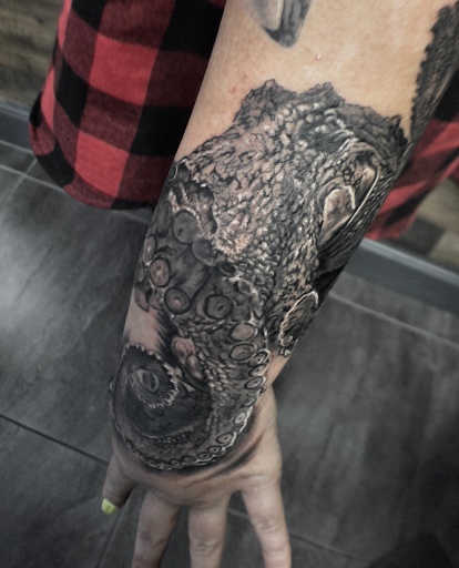 Explore cervical cancer tattoo ideas, creative tattoo ideas in Deerfield Beach, available at Black Rose Tattoo Studio